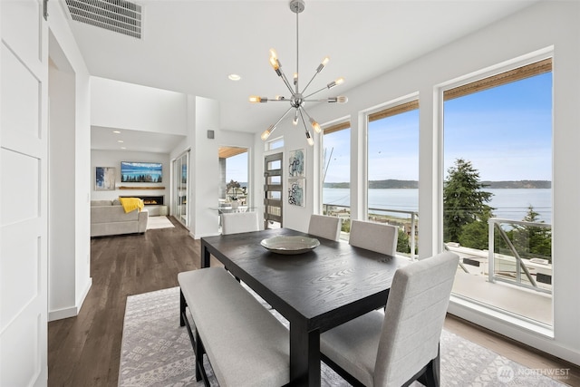 6720 Soundview Dr NE, Tacoma, WA 98422 - dining area featuring a chandelier, wood finished floors, and recessed lighting