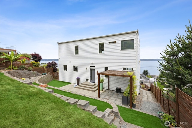 6720 Soundview Dr NE, Tacoma, WA 98422 - back of property featuring a fenced backyard and a patio