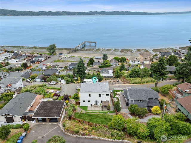 6720 Soundview Dr NE, Tacoma, WA 98422 - aerial perspective of suburban area featuring a large body of water