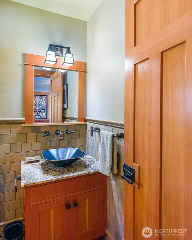 481 Grimes Riker Ln, Lopez Island, WA 98261 - bathroom featuring tile walls and vanity