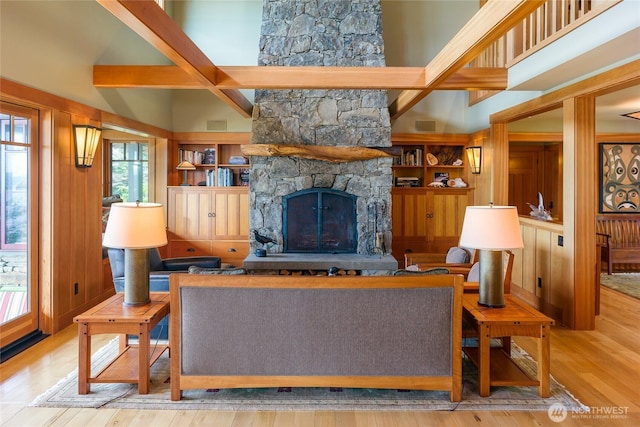 481 Grimes Riker Ln, Lopez Island, WA 98261 - living room with a fireplace, a high ceiling, and wood finished floors