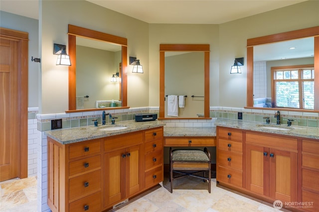 481 Grimes Riker Ln, Lopez Island, WA 98261 - full bath featuring vanity, tile walls, and a wainscoted wall