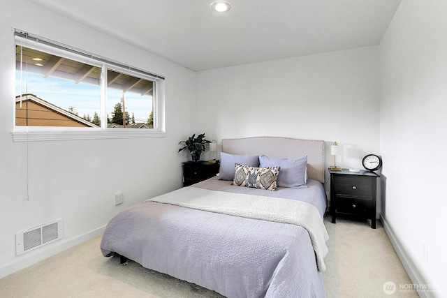21120 77th Pl W Unit 104, Edmonds, WA 98026 - bedroom with light colored carpet, baseboards, and recessed lighting