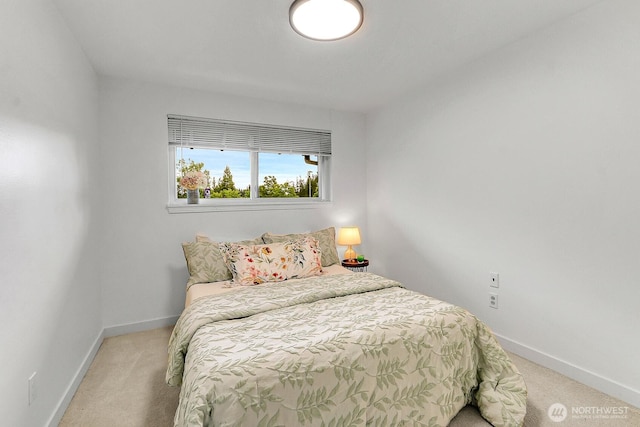 21120 77th Pl W Unit 104, Edmonds, WA 98026 - bedroom featuring light colored carpet and baseboards