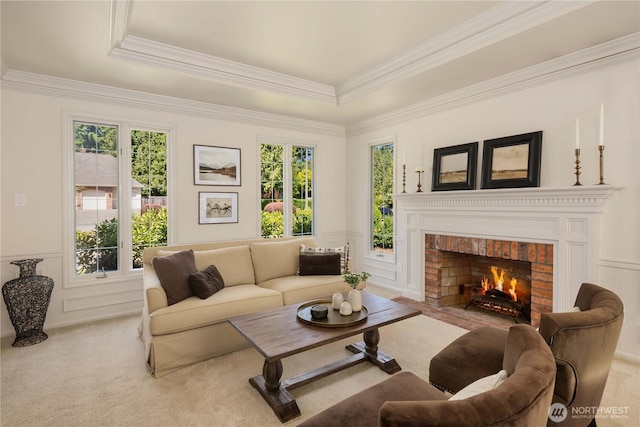 25819 NE 9th St, Sammamish, WA 98074 - carpeted living area featuring a fireplace, ornamental molding, and a raised ceiling
