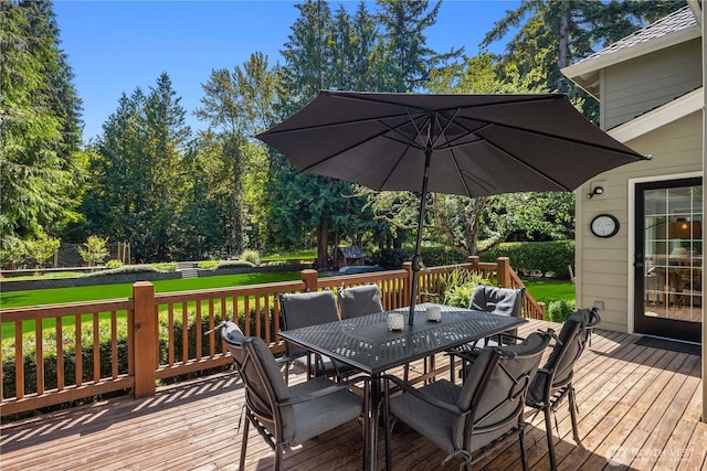 25819 NE 9th St, Sammamish, WA 98074 - wooden deck featuring outdoor dining space and a yard