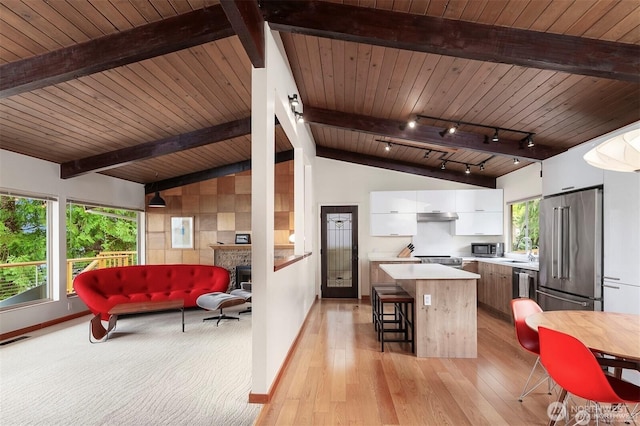 10762 Exeter Ave NE, Seattle, WA 98125 - kitchen featuring stainless steel appliances, light countertops, white cabinets, modern cabinets, and wooden ceiling