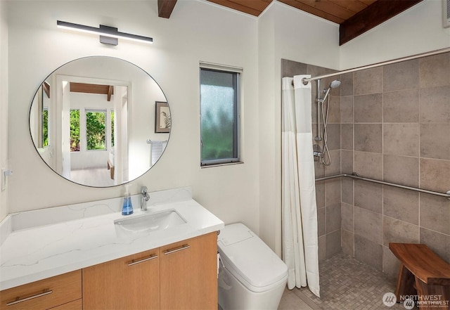 10762 Exeter Ave NE, Seattle, WA 98125 - full bath with vanity, tiled shower, toilet, and beam ceiling