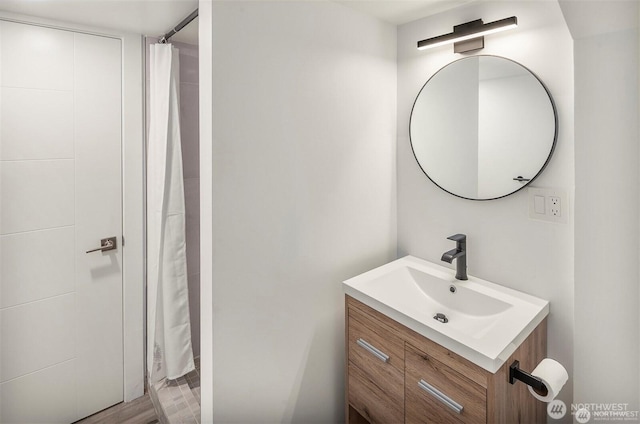 10762 Exeter Ave NE, Seattle, WA 98125 - bathroom with vanity and a shower with shower curtain