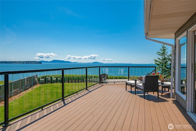 5691 Nakat Way, Blaine, WA 98230 - deck with a water and mountain view and a lawn