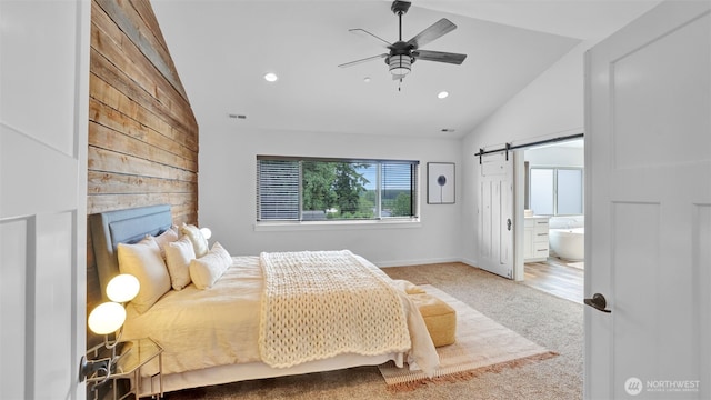 25625 SE Olympic Ln, Black Diamond, WA 98010 - bedroom featuring vaulted ceiling, carpet, recessed lighting, a barn door, and ensuite bathroom