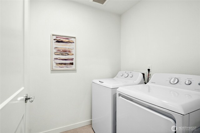 189 Countryman Dr, Monroe, WA 98272 - laundry room with washer and clothes dryer and baseboards