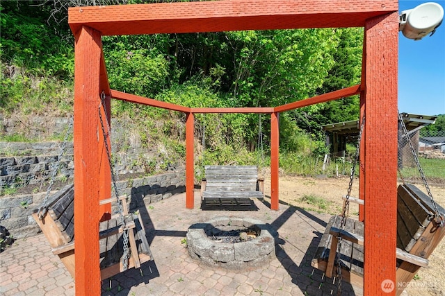 49 Mox Chehalis Rd, Elma, WA 98541 - view of patio / terrace with an outdoor fire pit