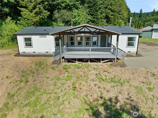 49 Mox Chehalis Rd, Elma, WA 98541 - manufactured / mobile home featuring crawl space, a porch, and a view of trees