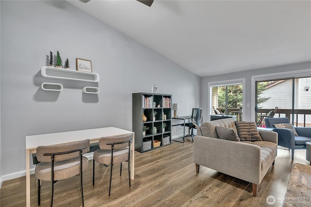17311 119th Ln SE Unit J4, Renton, WA 98058 - living area featuring vaulted ceiling and wood finished floors