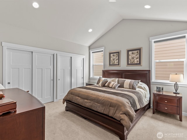 752 Parkland Loop, Sedro Woolley, WA 98284 - bedroom with vaulted ceiling, light carpet, two closets, and recessed lighting