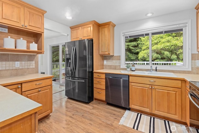 19203 Whitman Ave N, Shoreline, WA 98133 - kitchen with stainless steel appliances, a sink, tasteful backsplash, light countertops, and recessed lighting
