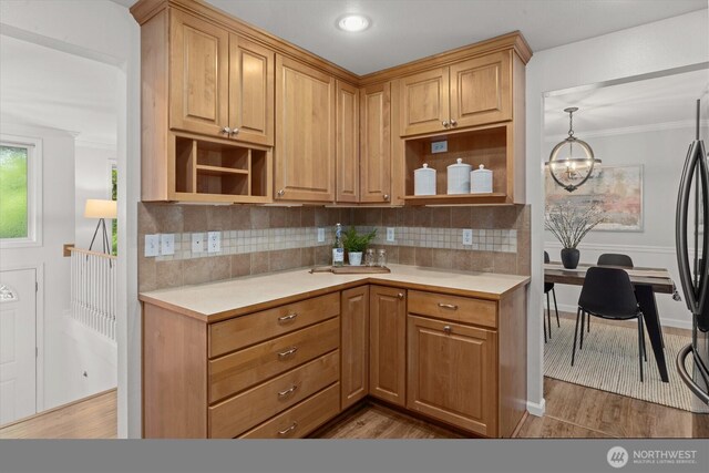 19203 Whitman Ave N, Shoreline, WA 98133 - kitchen with open shelves, light countertops, tasteful backsplash, and ornamental molding