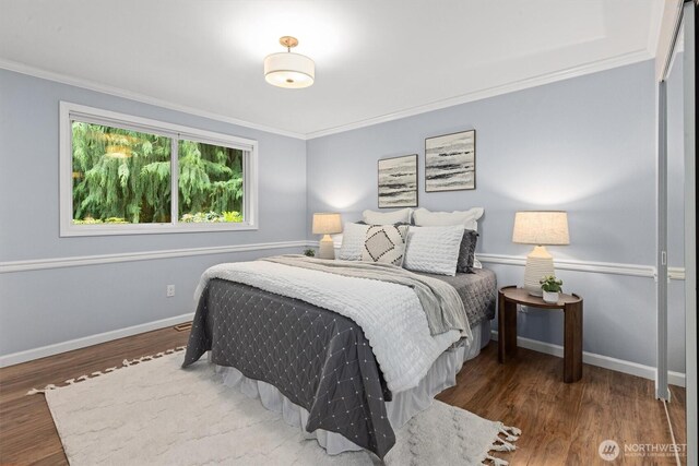 19203 Whitman Ave N, Shoreline, WA 98133 - bedroom featuring ornamental molding, wood finished floors, and baseboards
