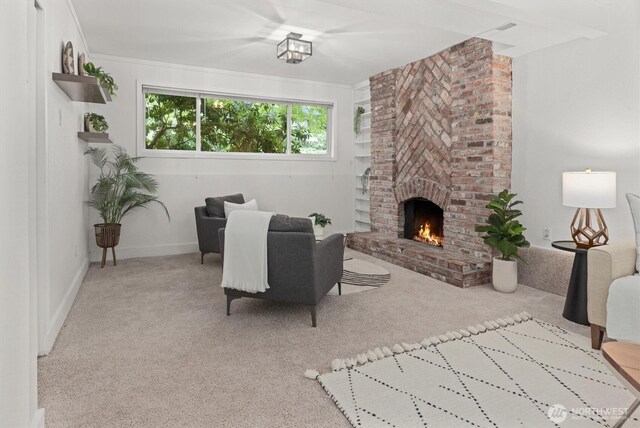 19203 Whitman Ave N, Shoreline, WA 98133 - living room featuring carpet flooring, a brick fireplace, and baseboards