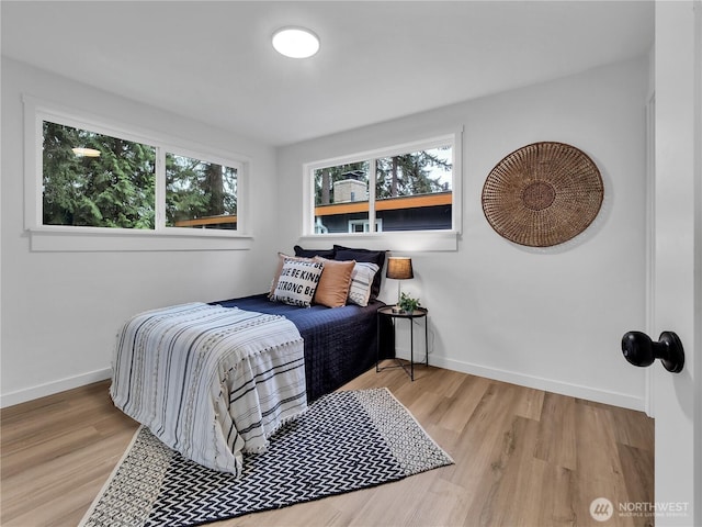16112 Densmore Ave N, Shoreline, WA 98133 - bedroom featuring wood finished floors and baseboards