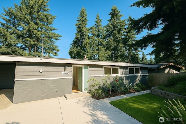 16112 Densmore Ave N, Shoreline, WA 98133 - view of front of home with a front lawn