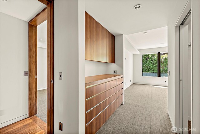 302 N Stadium Way Unit 302, Tacoma, WA 98403 - hall featuring light carpet, baseboards, and recessed lighting