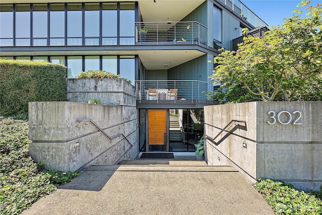302 N Stadium Way Unit 302, Tacoma, WA 98403 - doorway to property with a balcony