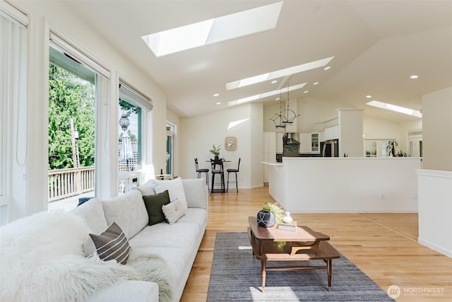 2921 Haggin St, Bellingham, WA 98226 - living area with a skylight, lofted ceiling, light wood-style flooring, and recessed lighting