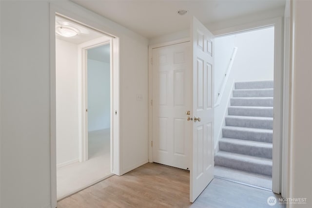 2921 Haggin St, Bellingham, WA 98226 - corridor with light wood-style flooring, stairway, and baseboards