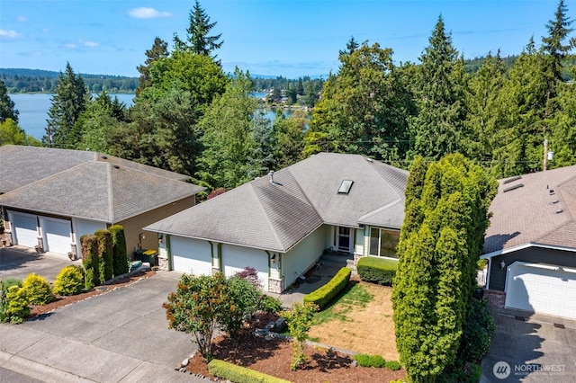 2921 Haggin St, Bellingham, WA 98226 - view from above of property with a forest and a large body of water
