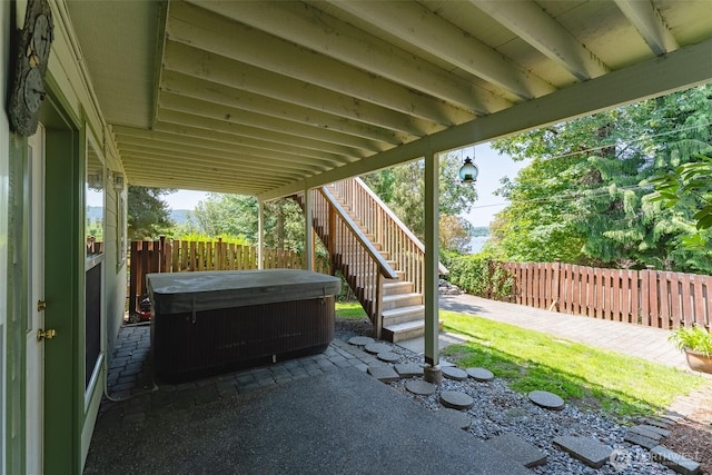 2921 Haggin St, Bellingham, WA 98226 - fenced backyard with a hot tub, a patio area, and stairway