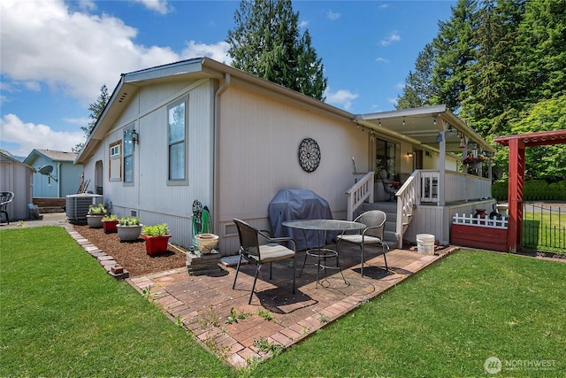 2259 Rincon Ave, Enumclaw, WA 98022 - rear view of house with a patio and central AC