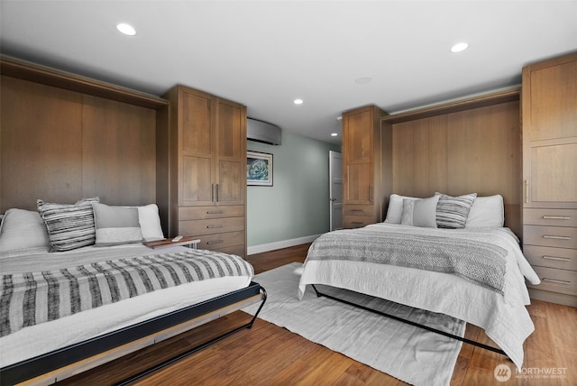 3404 Shorecliff Dr NE, Tacoma, WA 98422 - bedroom with an AC wall unit, recessed lighting, baseboards, and wood finished floors