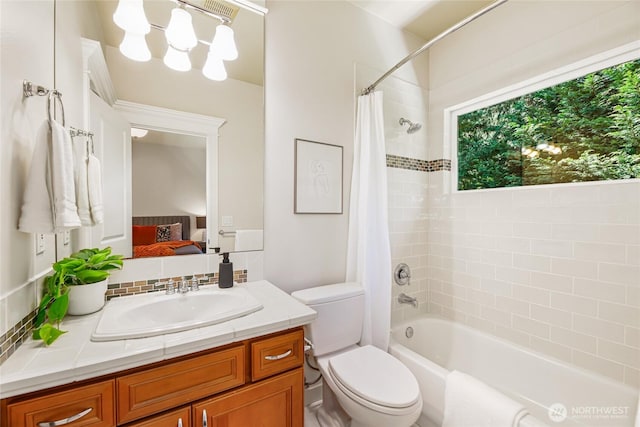 8380 SE 43rd St, Mercer Island, WA 98040 - ensuite bathroom featuring vanity, shower / bath combo, and toilet