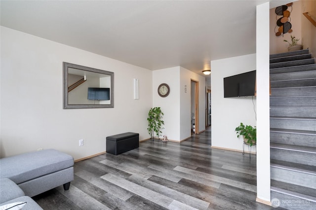 811 S Laventure Rd Unit C, Mount Vernon, WA 98274 - unfurnished living room featuring stairs, wood finished floors, and baseboards