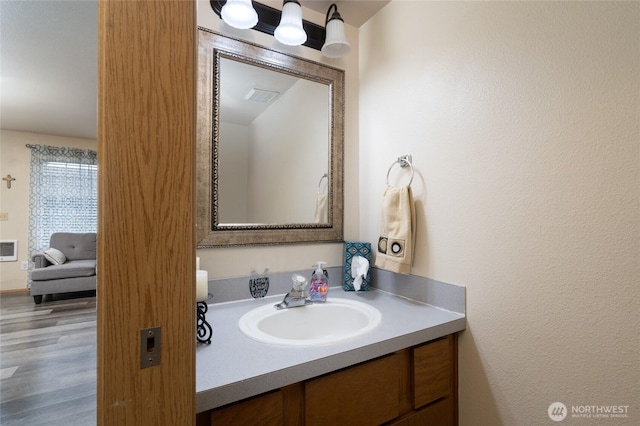 811 S Laventure Rd Unit C, Mount Vernon, WA 98274 - bathroom featuring vanity and wood finished floors