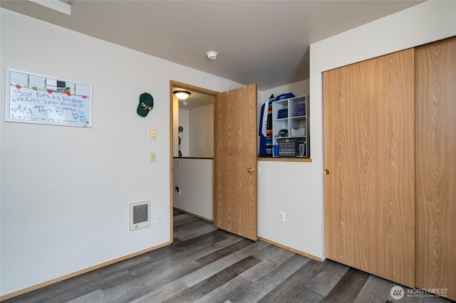 811 S Laventure Rd Unit C, Mount Vernon, WA 98274 - spare room featuring wood finished floors, a smoke detector, and heating unit