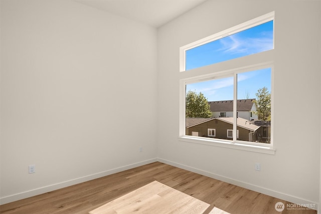 116 4th Ave S, Algona, WA 98001 - spare room featuring wood finished floors and baseboards