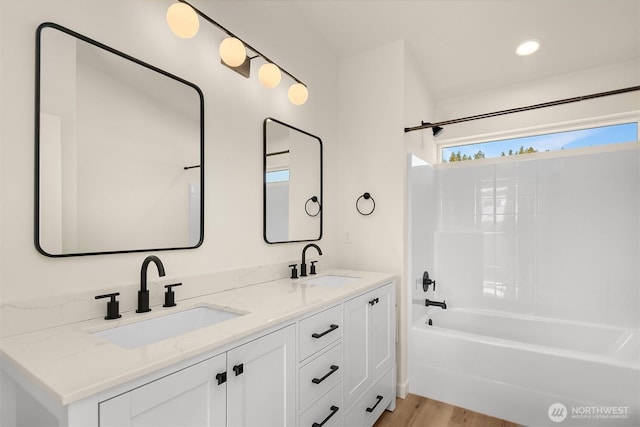 116 4th Ave S, Algona, WA 98001 - full bathroom with washtub / shower combination, double vanity, wood finished floors, and recessed lighting