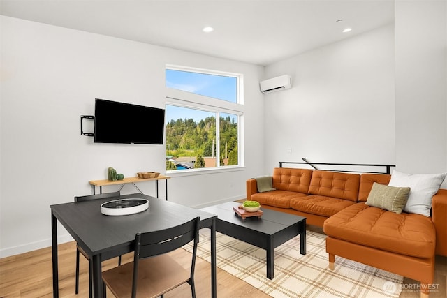 116 4th Ave S, Algona, WA 98001 - living area with a wall unit AC, recessed lighting, baseboards, and light wood-style flooring