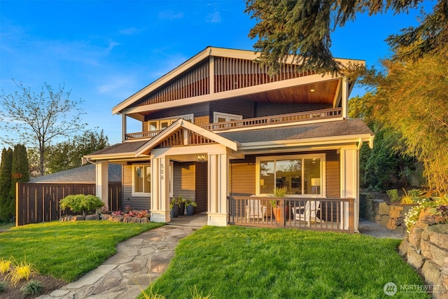 506 13th Ave W, Kirkland, WA 98033 - view of front of house with a balcony, a porch, a front lawn, and roof with shingles