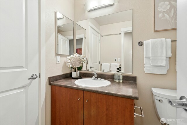 11309 NE 128th St Unit F302, Kirkland, WA 98034 - bathroom with vanity and toilet