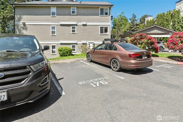 11309 NE 128th St Unit F302, Kirkland, WA 98034 - back of property featuring uncovered parking