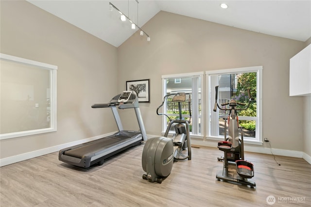 11309 NE 128th St Unit F302, Kirkland, WA 98034 - exercise area with light wood-type flooring, baseboards, and high vaulted ceiling