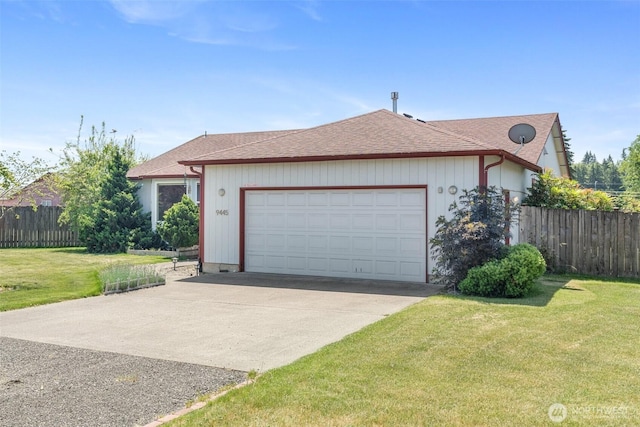 9445 181st Way SW, Rochester, WA 98579 - view of front facade featuring an attached garage, roof with shingles, and driveway