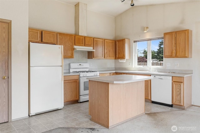 9445 181st Way SW, Rochester, WA 98579 - kitchen featuring white appliances, high vaulted ceiling, under cabinet range hood, light countertops, and a kitchen island