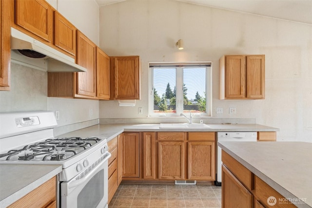 9445 181st Way SW, Rochester, WA 98579 - kitchen featuring white appliances, under cabinet range hood, a sink, and light countertops