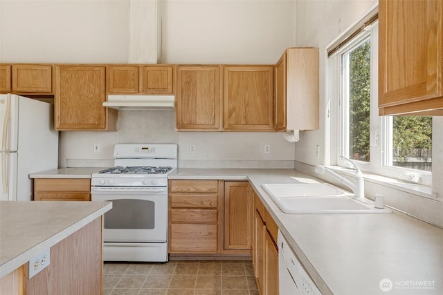 9445 181st Way SW, Rochester, WA 98579 - kitchen with white appliances, under cabinet range hood, and light countertops