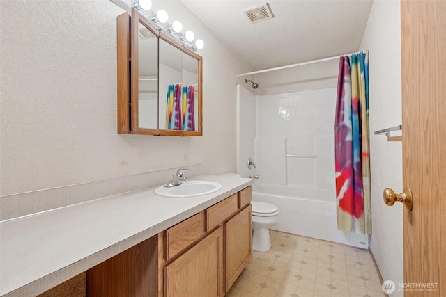 9445 181st Way SW, Rochester, WA 98579 - bathroom with vanity, toilet, shower / tub combo with curtain, and tile patterned floors